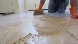 How to grout a tile floor [upl. by Aicilana]